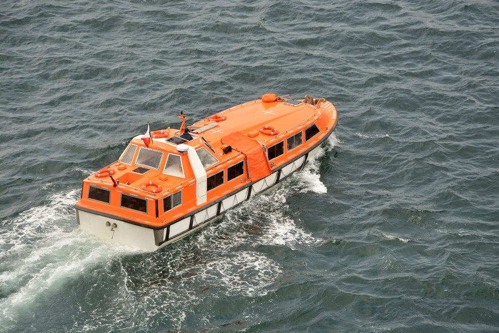 Tender Boat Orange Tender Boat On Water